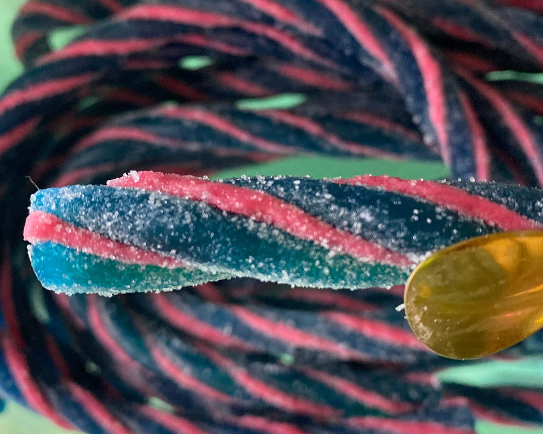 Two feet long Swedish Candy Log Sour Wild Strawberry, Sour Fizzy Blue and Candy Cane Twist