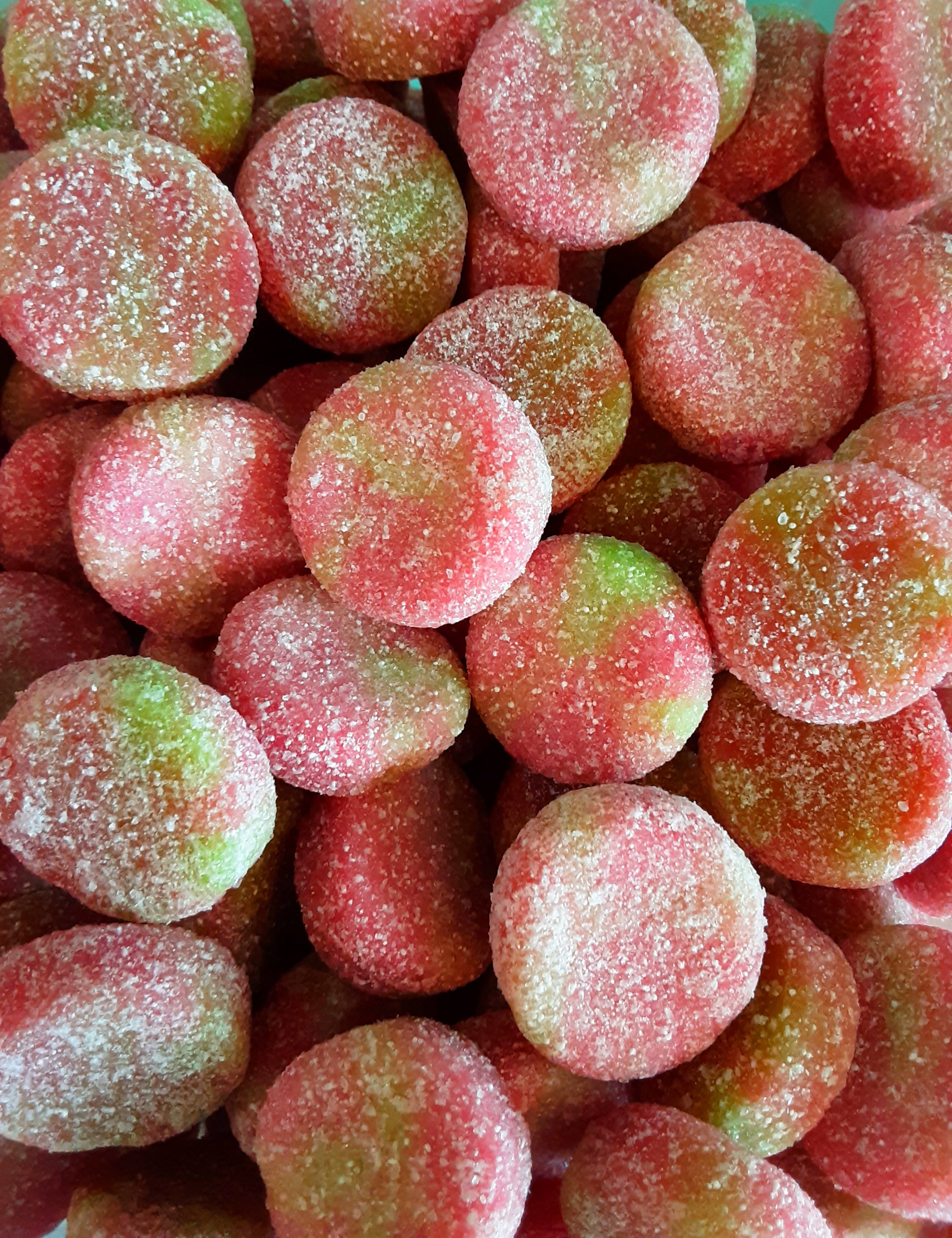 Close-up of pink and green gummy candies
