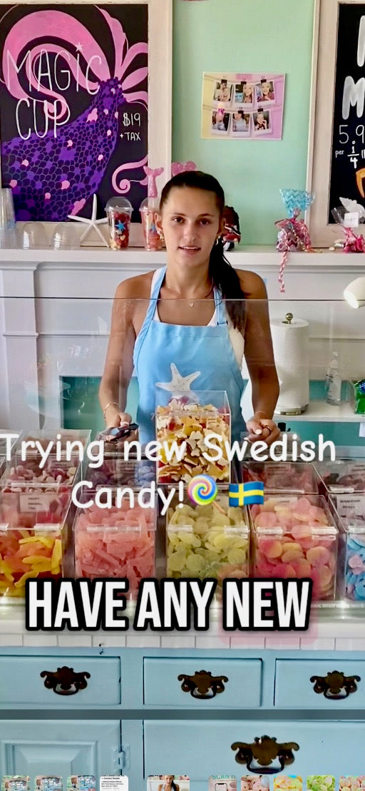 Person in a candy store with colorful candies and text about Swedish candy.